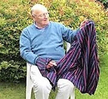 Colin Osbourne admiring Sir Raymond Priestley’s blazer Colin Osbourne admiring Sir Raymond Priestley’s blazer